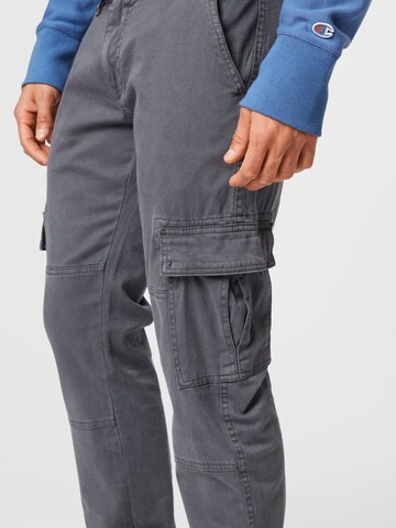 Tapered Pantaloni cu buzunare de la Urban Classics pe gri