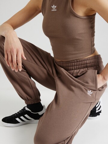 ADIDAS ORIGINALS Tapered Trousers 'Essentials Fleece' in Brown