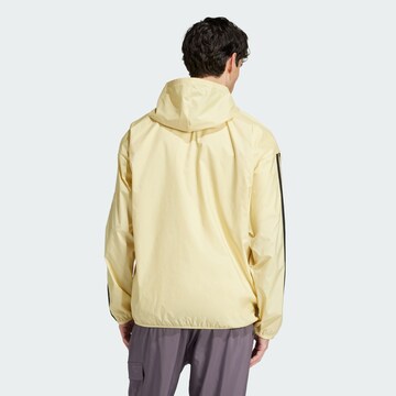 ADIDAS SPORTSWEAR Spordijope 'Essentials', värv kollane