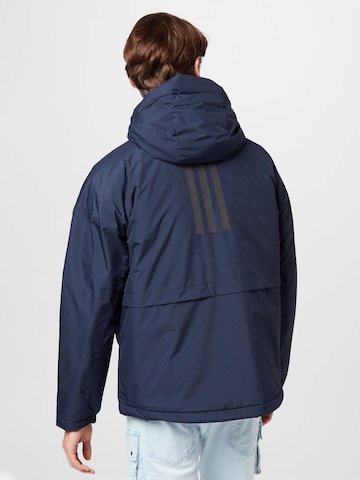 ADIDAS SPORTSWEAR - Casaco deportivo 'Traveer Insulated' em azul