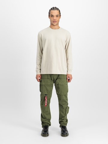 ALPHA INDUSTRIES Tapered Cargobyxa 'Tactical' i grön: framsida