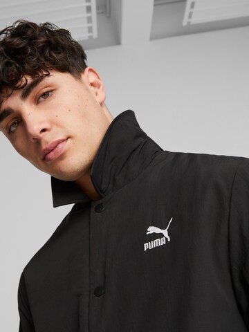 PUMA Sportjacke in Schwarz