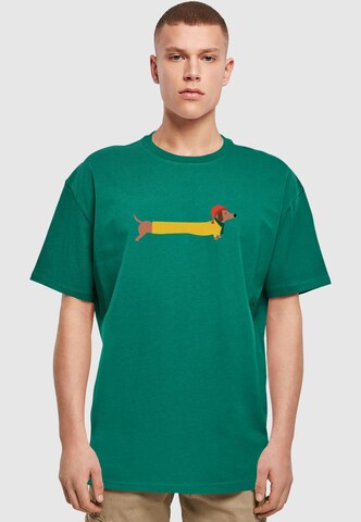 Merchcode Shirt 'Christmas Dog' in Groen: voorkant
