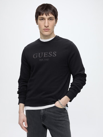 GUESSSweater majica - crna boja: prednji dio