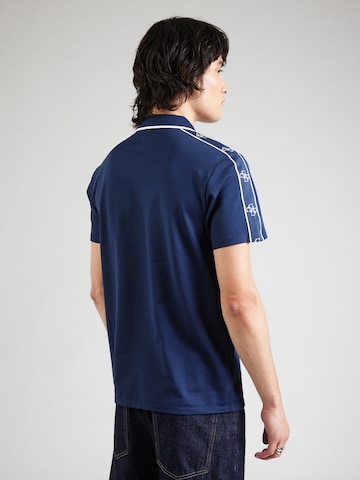 GUESS Bluser & t-shirts 'QUATTRO' i blå