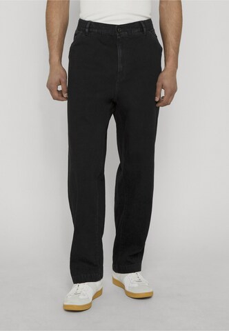 REPLAY Tapered Jeans in Black: front
