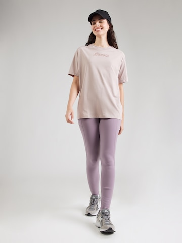 Maglia funzionale di ASICS in rosa