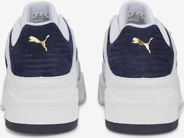 Baskets basses 'Slipstream' PUMA en blanc