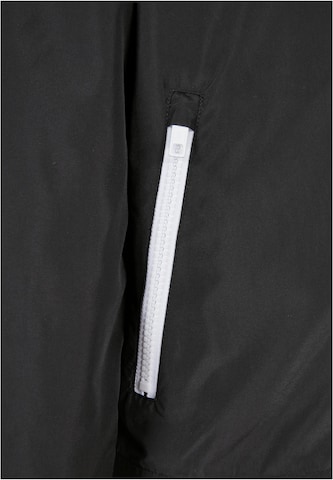 Urban ClassicsPrijelazna jakna 'Windunner' - crna boja