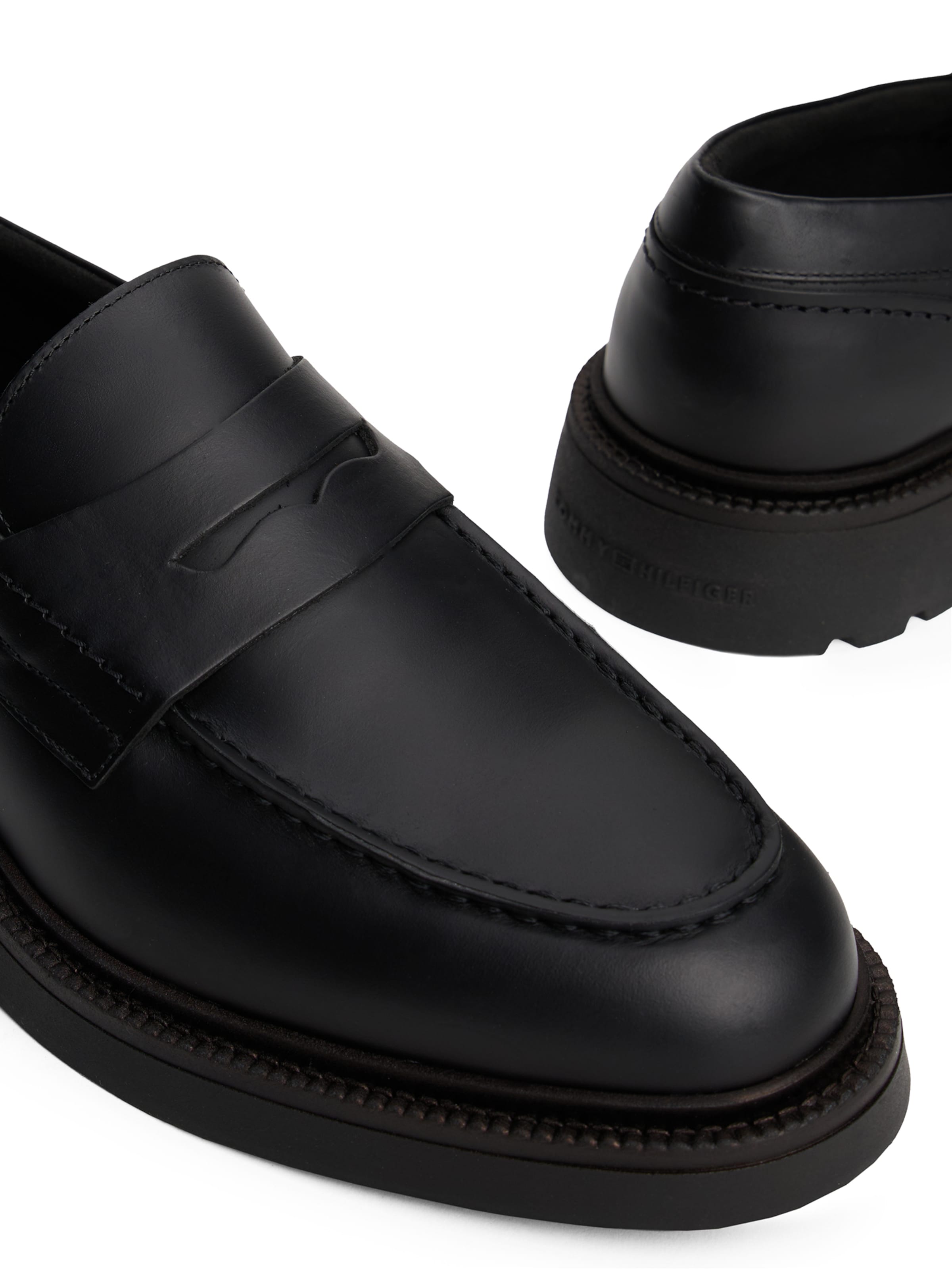 TOMMY HILFIGER Slip-ons in Black