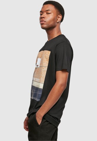 Mister Tee Regular Fit Paita 'Raised By The Streets' värissä musta