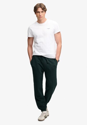 Superdry & Co Tapered Hose 'Essential' in Grün