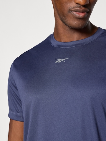 Reebok Funkční tričko 'ID TRAIN' – modrá