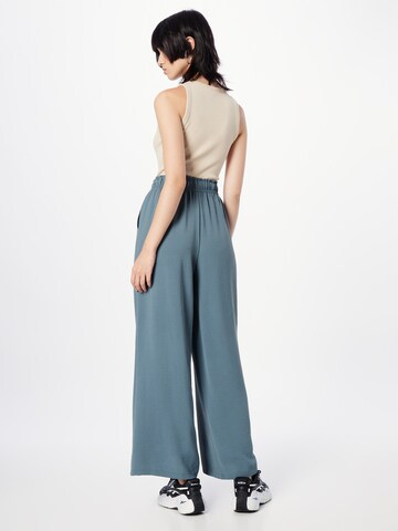 ABOUT YOU Wide leg Trousers 'Elin' in Green