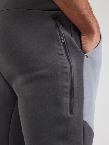 Nike Sportswear Tapered Παντελόνι 'TCH FLC' σε γκρι
