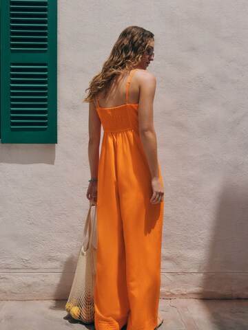 Tuta jumpsuit 'Cornelli' di Next in arancione
