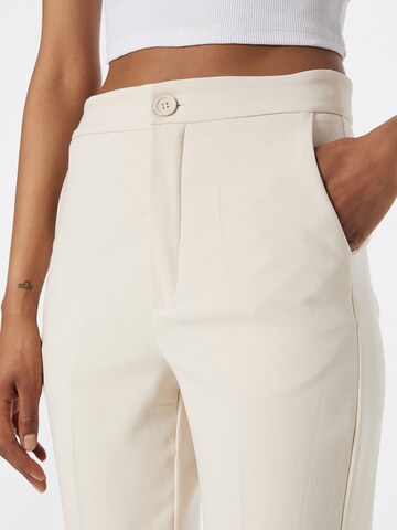 Gina Tricot Slim fit Trousers with creases 'Karin' in Beige