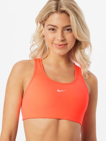 Bustino Reggiseno sportivo di NIKE in arancione: frontale