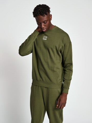 Hummel Sportsweatshirt 'LP10' in Groen: voorkant