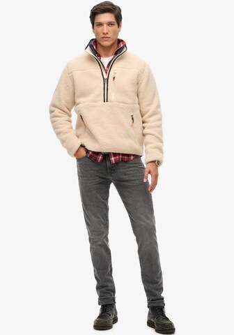 Superdry Pullover in Beige