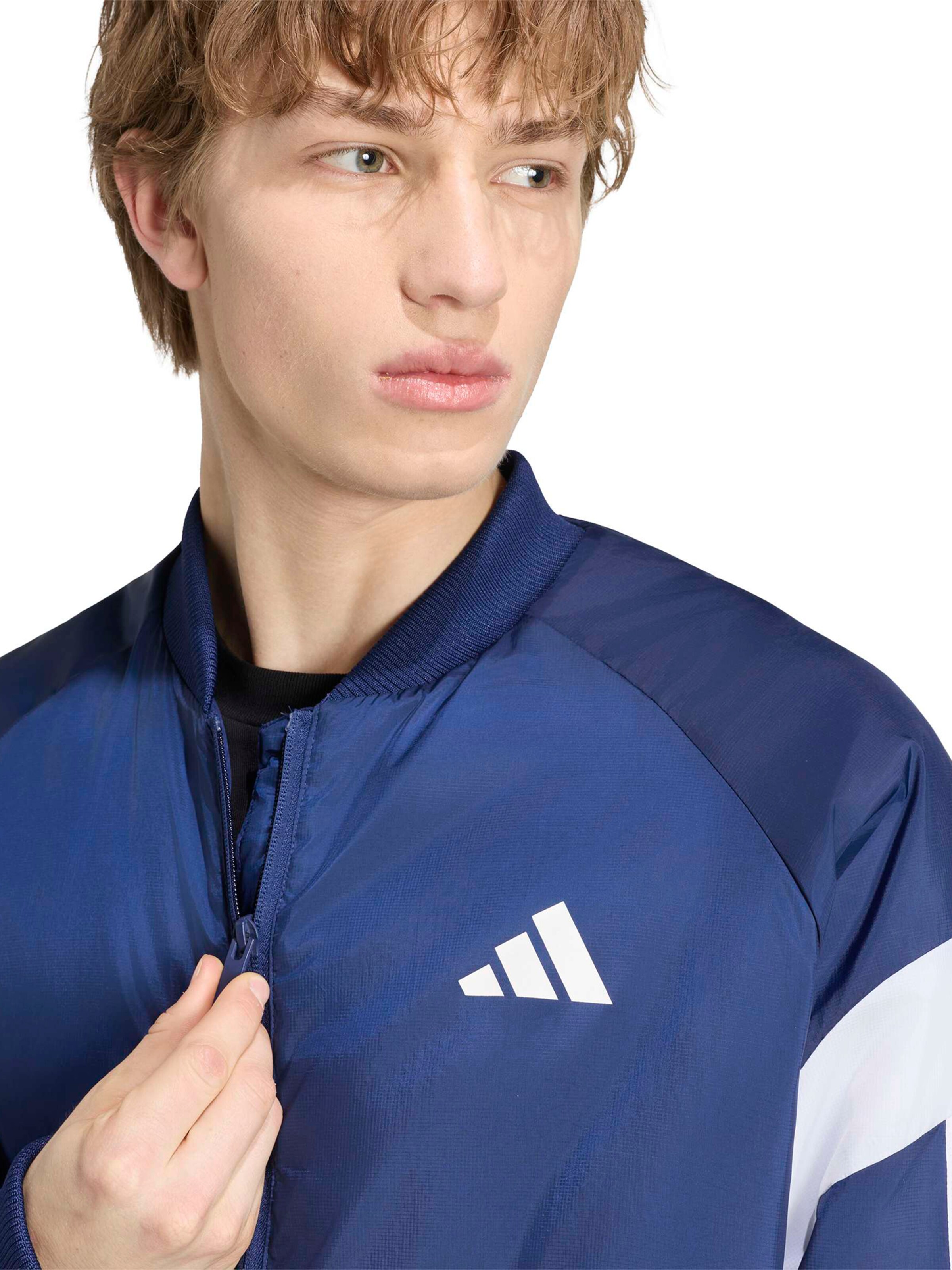 ADIDAS SPORTSWEAR - Chaqueta deportiva 'TIRO' en azul