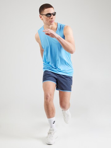 NIKE Regular Sports trousers 'HERITAGE' in Blue