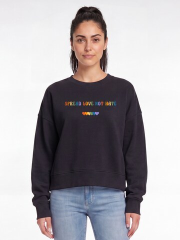 Watapparel Sweatshirt 'Spread Love Not Hate' in Black: front