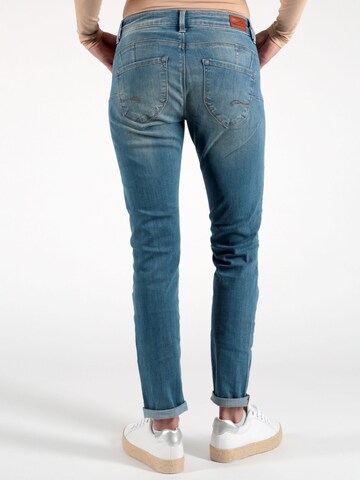 Miracle of Denim Skinny Jeans in Blue: front