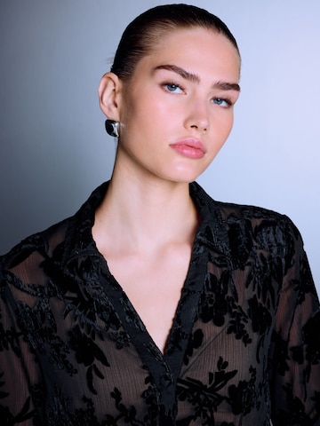 Next - Blusa en negro