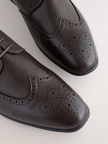 Next Čevlji na vezalke | rjava barva