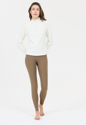 Athlecia Skinny Sports trousers 'Luxe' in Brown