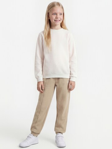 Effilé Pantalon ADIDAS ORIGINALS en beige : devant