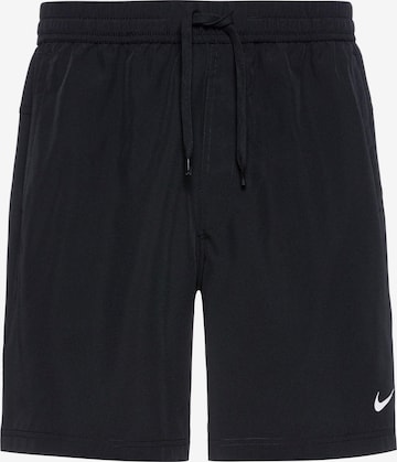 Pantaloni sport de la NIKE pe negru: față