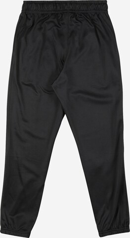 Effilé Pantalon de sport NIKE en noir