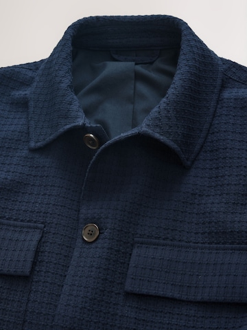 Next Tussenjas in Blauw