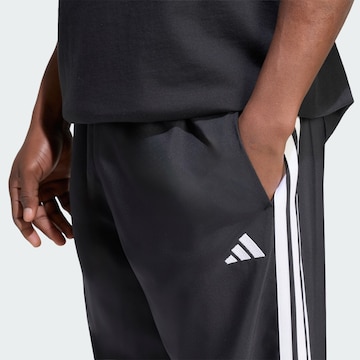ADIDAS SPORTSWEAR Normalny krój Spodnie sportowe 'Essentials' w kolorze czarny