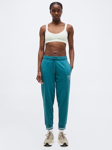 PUMA Zúžený Sportovní kalhoty 'CLASS' – zelená