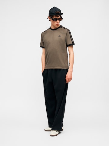 Wide Leg Pantalon 'Teamgeist 26' ADIDAS ORIGINALS en noir