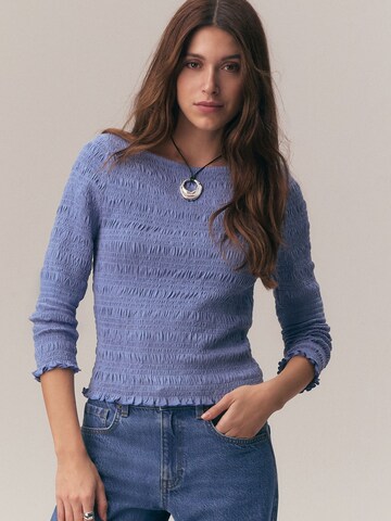 zils Next T-Krekls: no priekšpuses