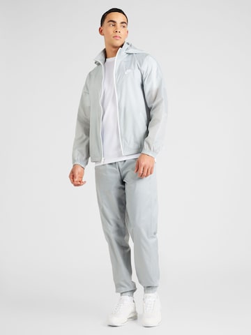 Nike Sportswear - Fato de jogging em cinzento: frente