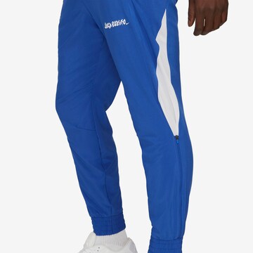 Tapered Pantaloni sportivi di NIKE in blu