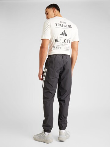 ADIDAS SPORTSWEAR Tapered Sportbroek in Zwart