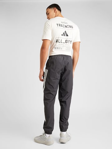ADIDAS SPORTSWEAR Tapered Sports trousers in Black