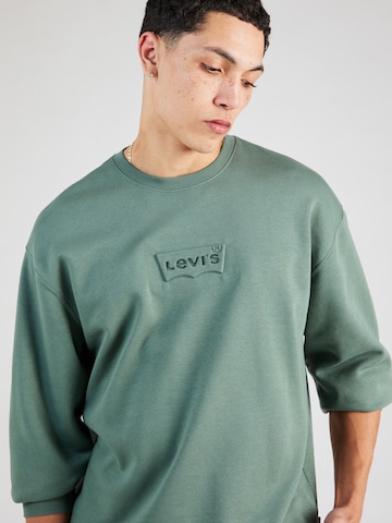 LEVI'S ®Sweater majica 'Relaxd Graphic Crew' - zelena boja