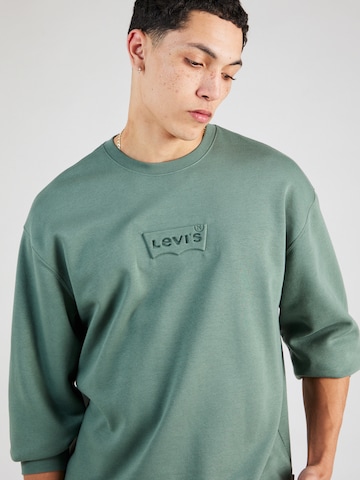 LEVI'S ® Sweatshirt 'Relaxd Graphic Crew' i grön