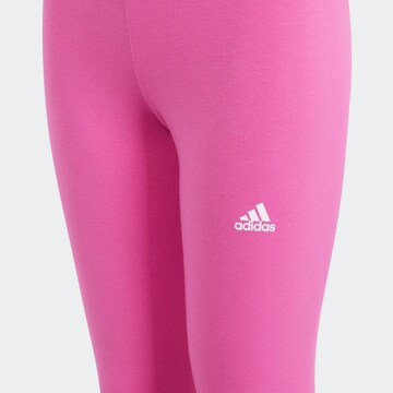 ADIDAS SPORTSWEAR - Tapered Calças de desporto 'Essentials' em rosa