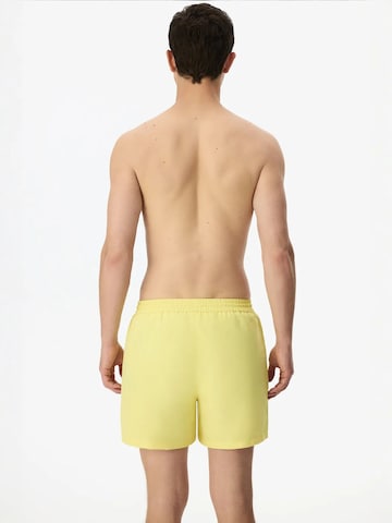 Penti Rövid fürdőnadrágok 'PENTI Herren Badeshorts Opposite Line' - sárga