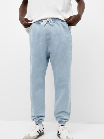 Pull&Bear Tapered Jeans in Blue: front