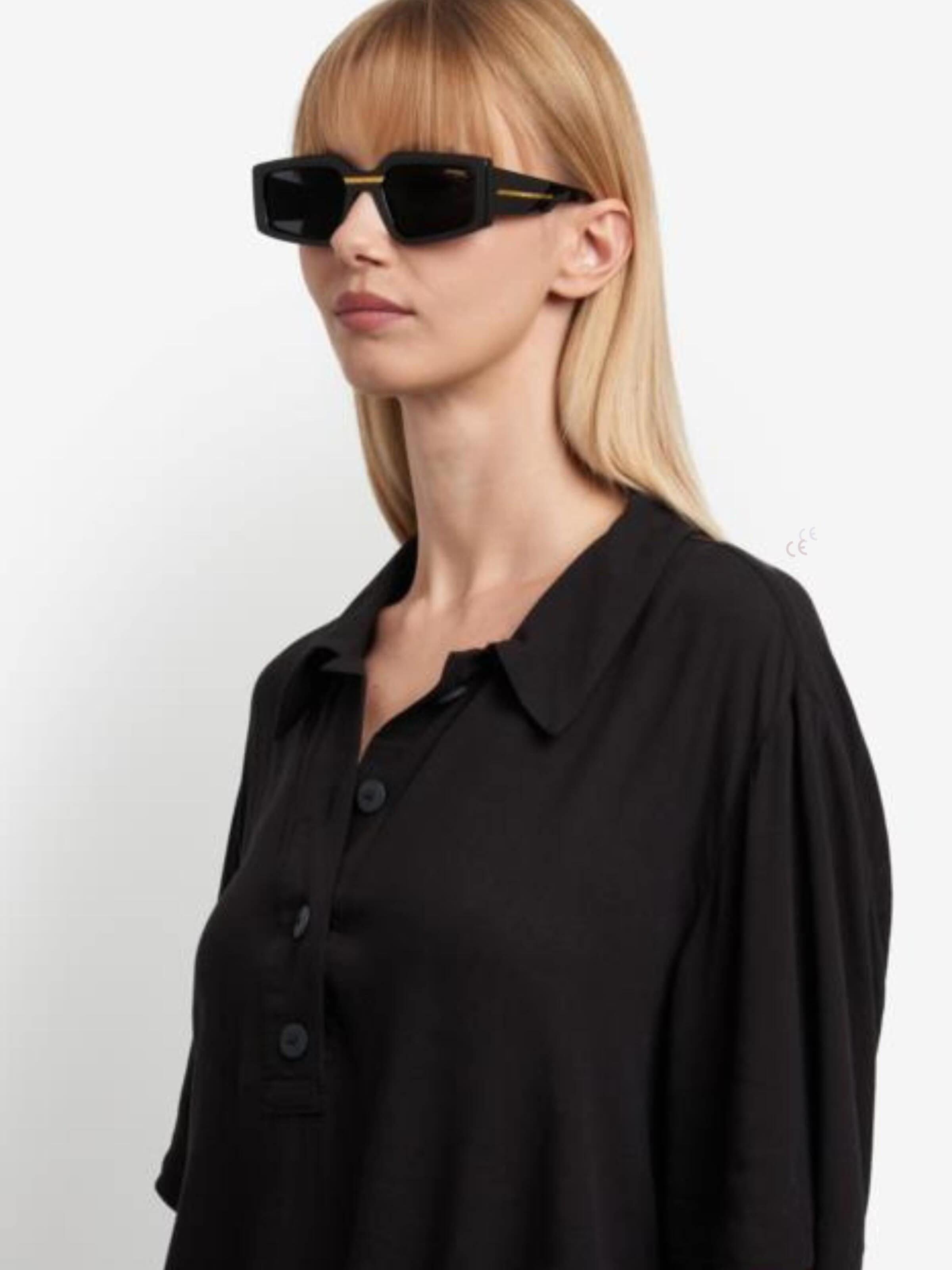 Lunettes de soleil Carrera en noir