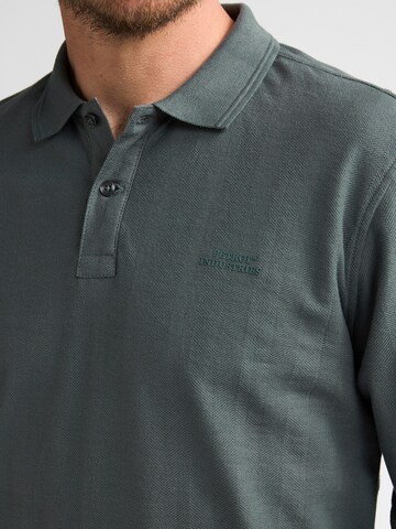 Petrol Industries Poloshirt in Grün